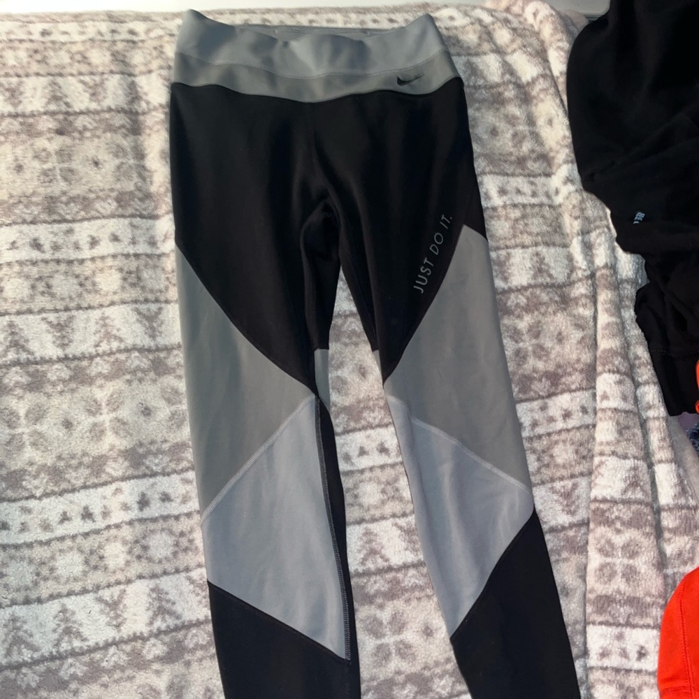 Nike leggings, black and grey size small, no pockets, athletic material